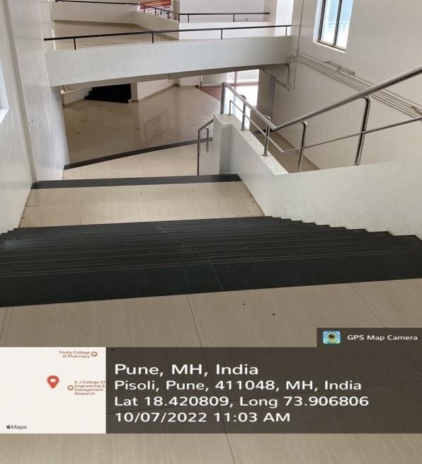 Staircase with metal rails